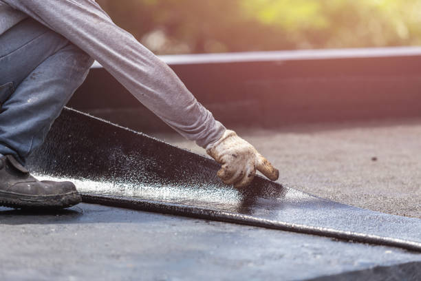 Professional Basement Waterproofing technician working in Kent, OH